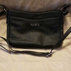 Shoulder bad by Jessica Simpson.  Nice soft leathe